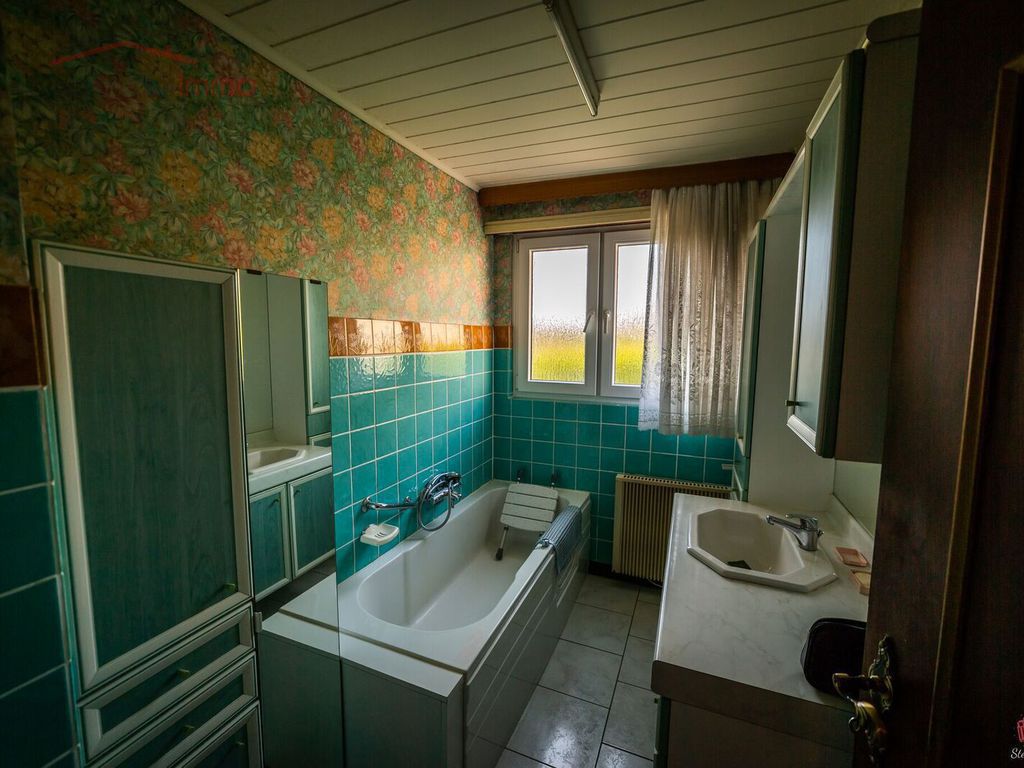 Maison individuelle, dans un endroit calme d'Insming. - Port salle de bain