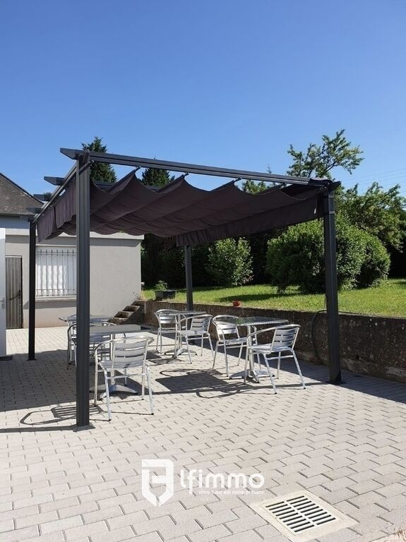 Immeuble comprenant un Local commercial et un appartement. - Pizzeria terrasse 2