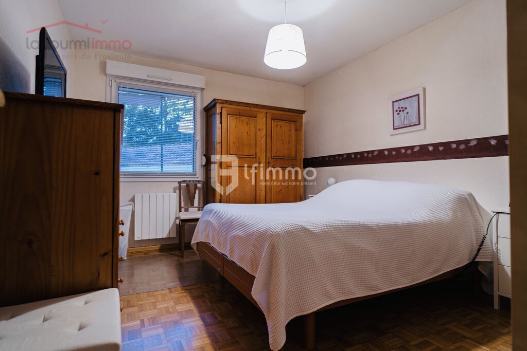 Lumineux 3 pièces avec 2 balcons, double garage et cave  - chambre 2