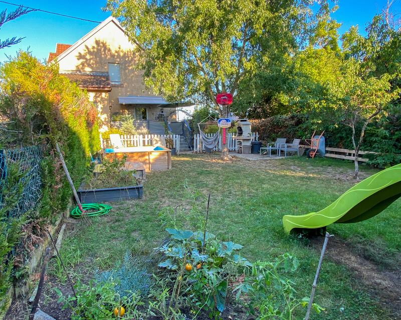 Charmante maison mitoyenne dans un bel environnement - Jardin