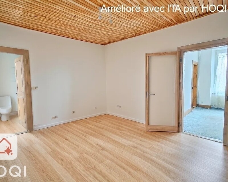 T3 à rénover avec garage, cave et grenier à Thann (68800) - home staging virtuel salon