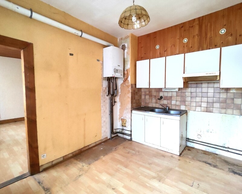 T3 à rénover avec garage, cave et grenier à Thann (68800) - cuisine