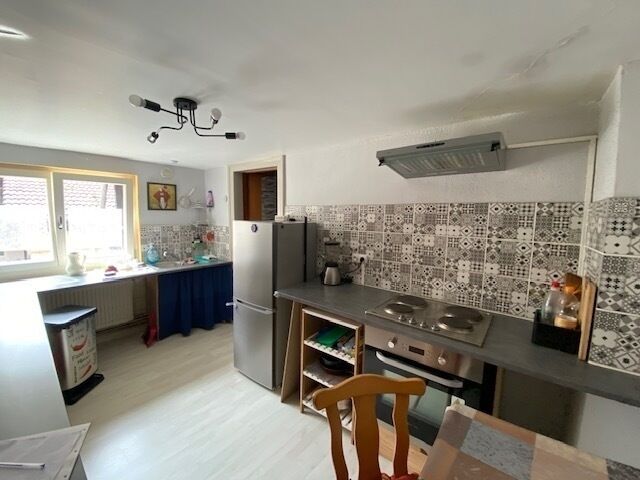 Ensemble immobilier, 1 local commercial et 2 appartements.  - Cuisine derras5