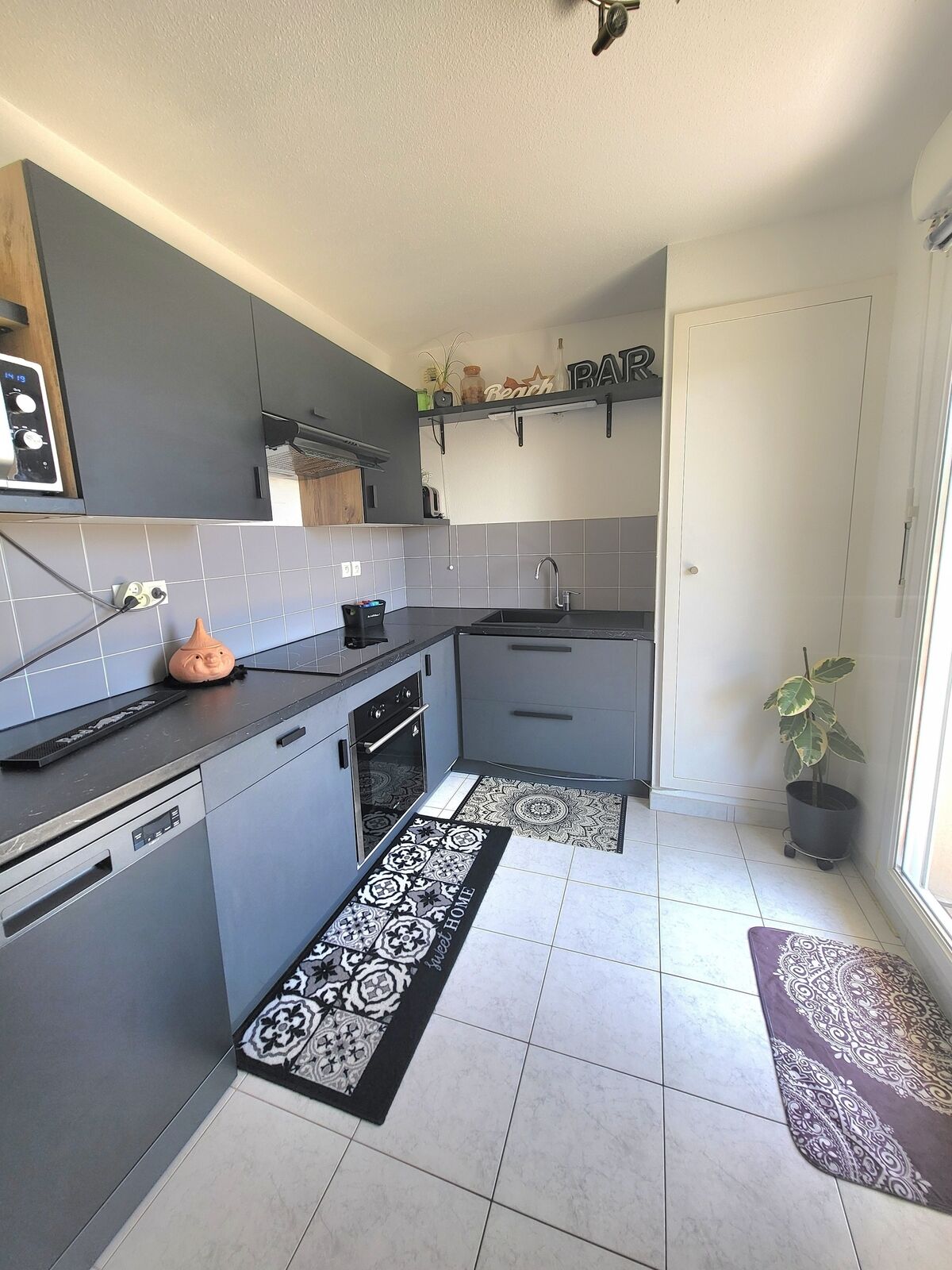 Appartement 2 pièces avec terrasse et garage - 1000048792