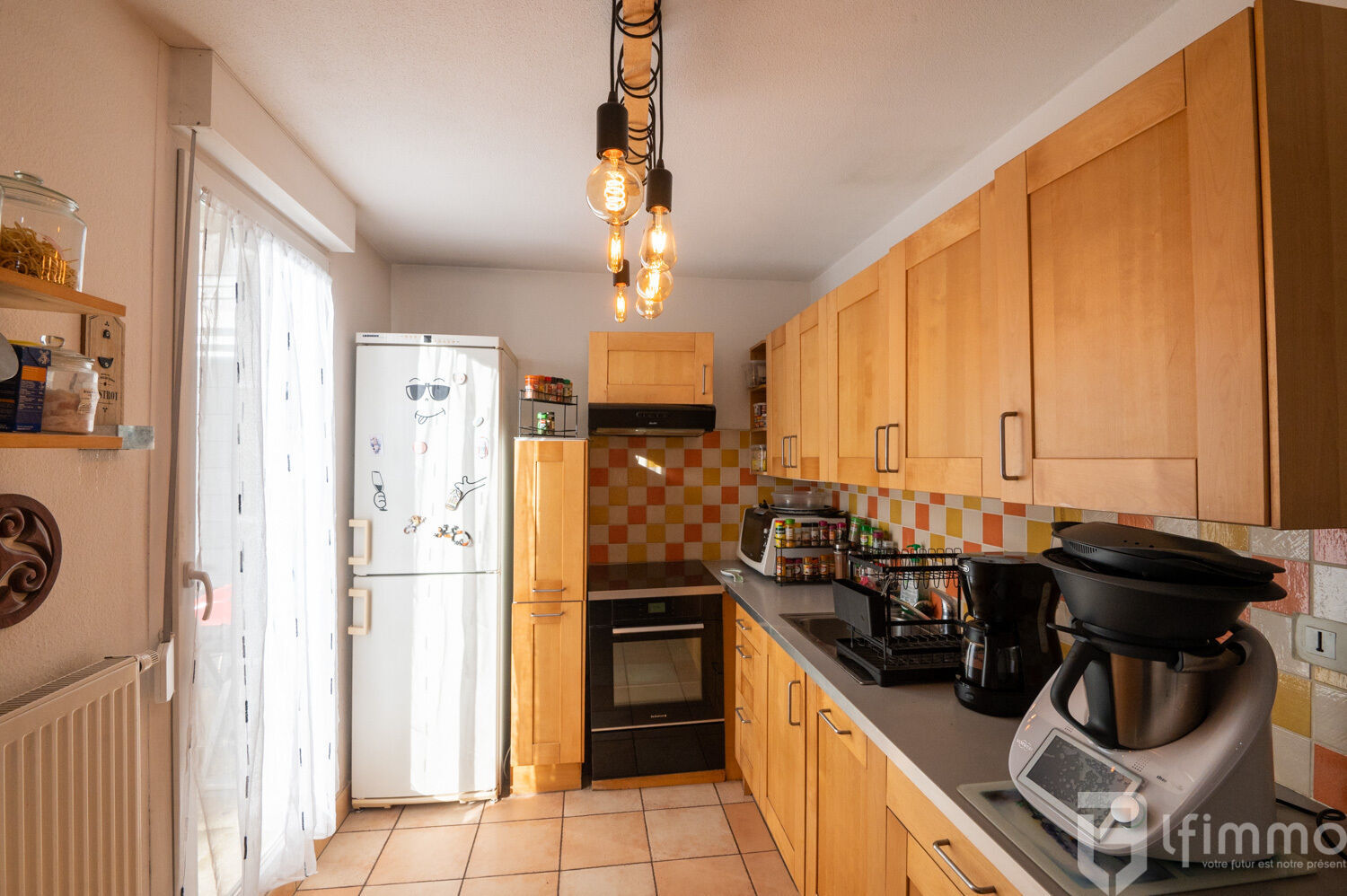 Chaleureux 4 pièces de 82 m² env. en rez-de-jardin - Cuisine