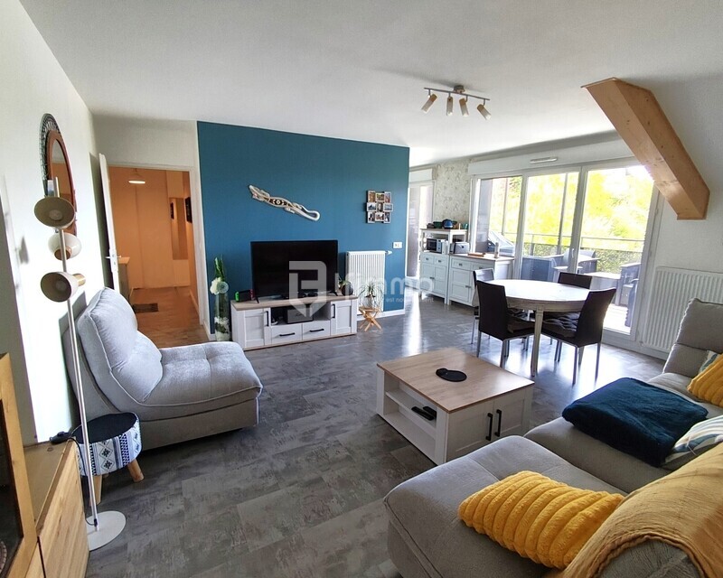 Appartement en dernier étage avec terrasse et vue dégagée  - Salon