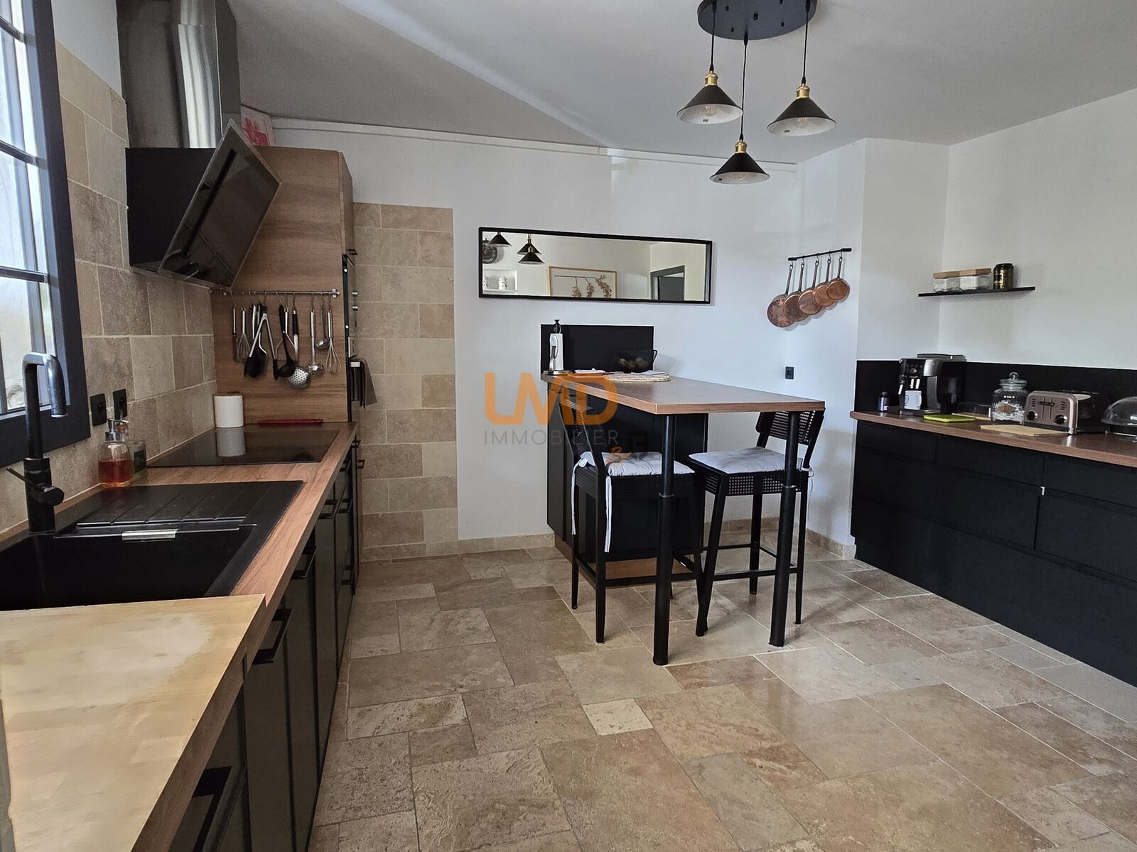 L’espace, le confort et le potentiel réunis en centre-ville. - Cuisine