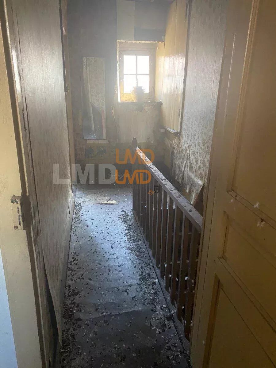 Immeuble composé 2 logements T2 + T4 avec garages à rénover - 10f920ae-aa83-4432-ba1b-8348f9002989