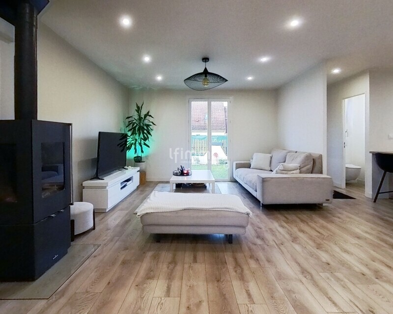 Une maison où il fait bon vivre, au cœur d’un quartier recherché. - Living-room