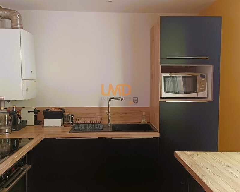 Appartement 4 chambres - Ascenseur - Terrasse - Cuisine