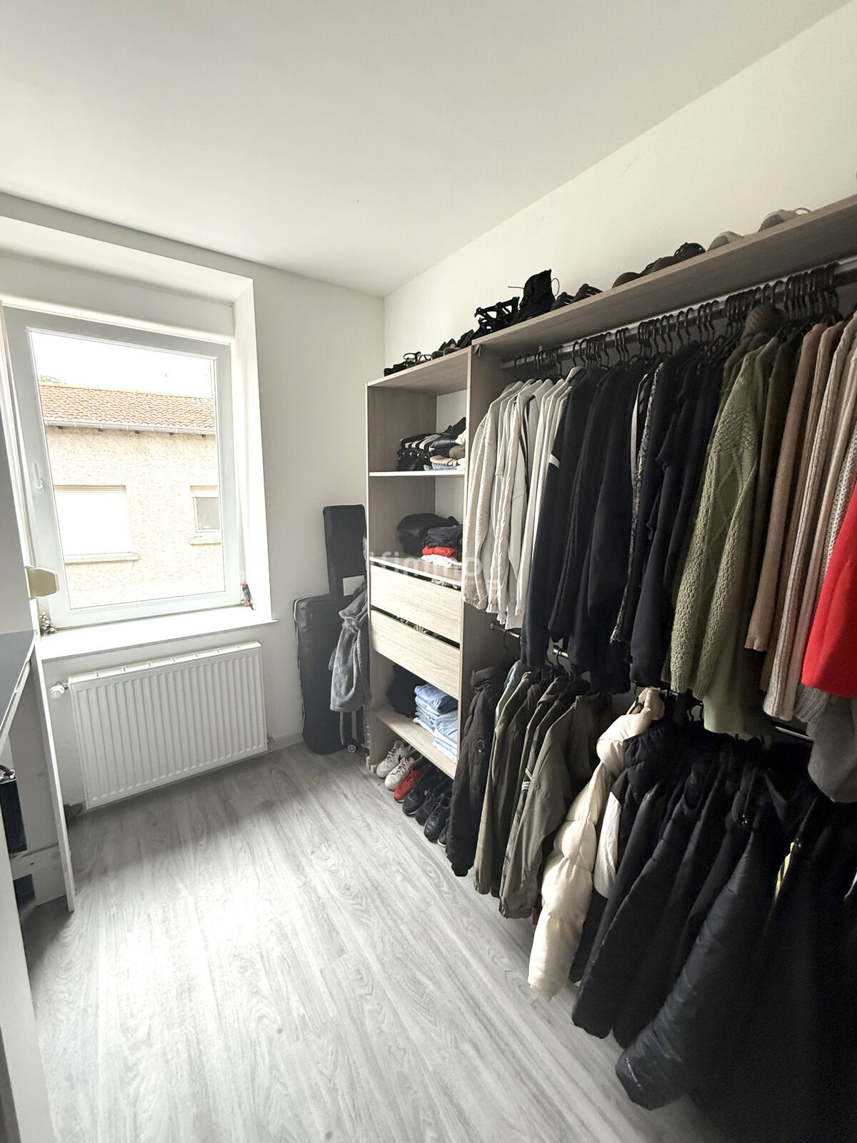Vends à Boulay, immeuble avec magasin + appart. neuf 100m2  - Dressing