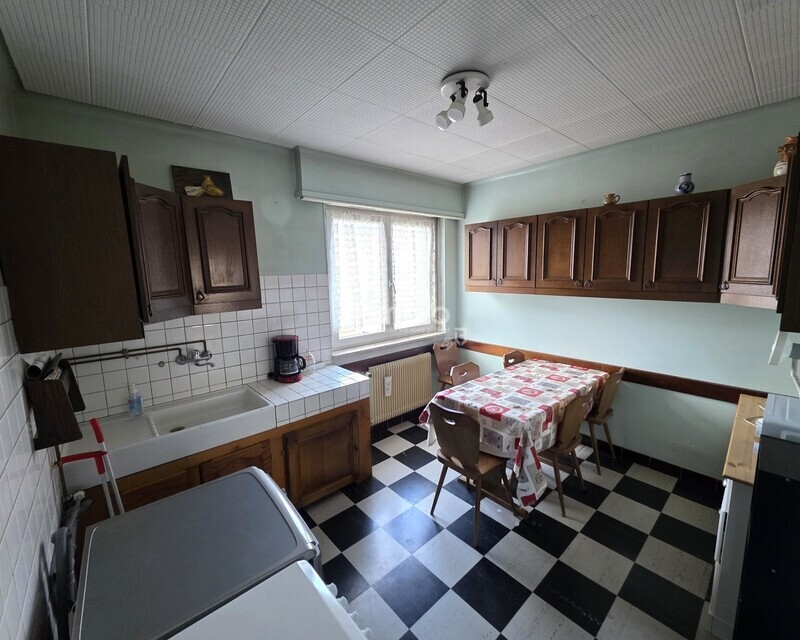 Maison de plain-pied surélevé au fort potentiel - cuisine