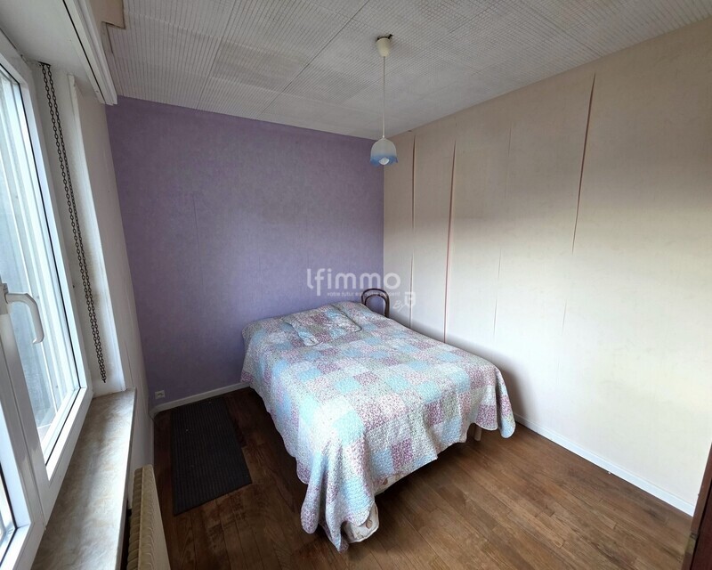 Maison de plain-pied surélevé au fort potentiel - chambre attenante salon